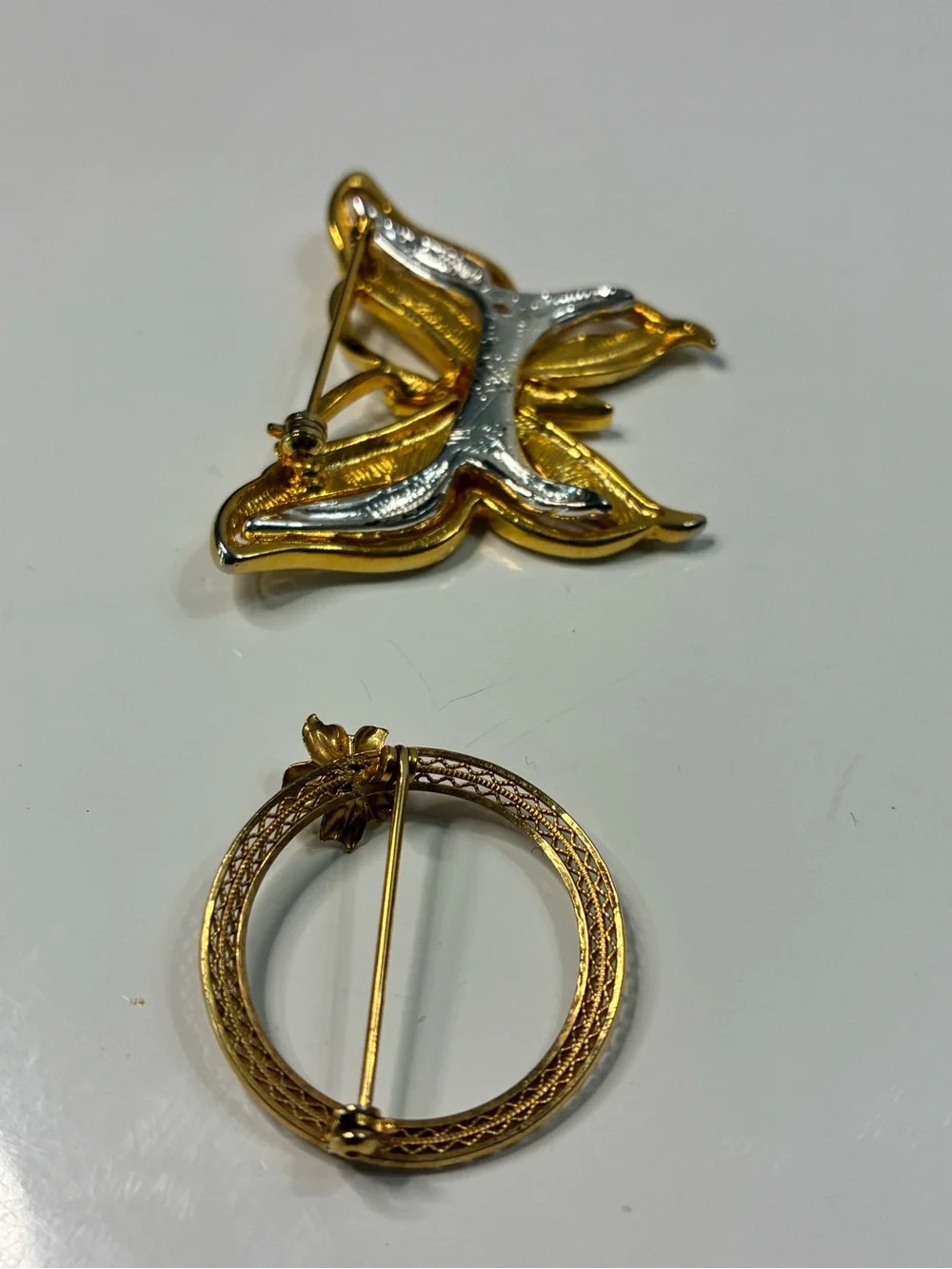 Two-Tone Gold and Silver Butterfly Brooch and Classic Infinity Floral Pin
